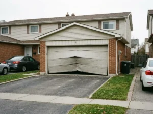 Bent and Damaged Garage Door
