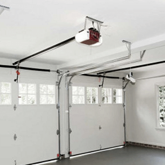 Garage Door Opener Repair completed for a white garage with two doors