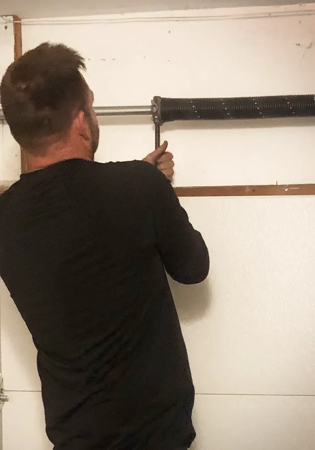 Jim Beam Repairing A Garage Door Spring
